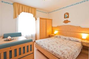 Postel nebo postele na pokoji v ubytování Albergo San Rocco