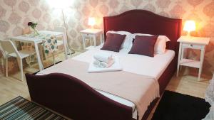 Cama o camas de una habitación en Garsoniera Lux Fundeni