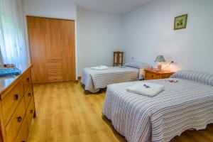 Кровать или кровати в номере Aguas Frias III