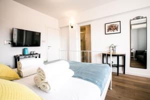 Posteľ alebo postele v izbe v ubytovaní The Harmony Rooms