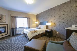 Postel nebo postele na pokoji v ubytování Sunrise Inn