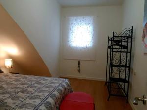A bed or beds in a room at Casa Coqueta y confortable en Oviedo