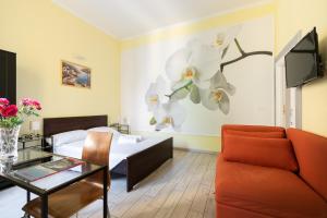 TV a/nebo společenská místnost v ubytování SCALA GARDEN Apartment