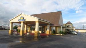 a dunkin donuts store in a parking lot at Days Inn by Wyndham Blytheville in Blytheville