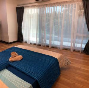 Postel nebo postele na pokoji v ubytování Home Suhaila