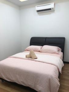 Postel nebo postele na pokoji v ubytování Home Suhaila