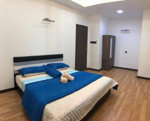 Postel nebo postele na pokoji v ubytování Home Suhaila
