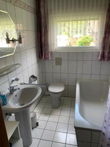 Ванная комната в Ferienwohnung am Fackelstein