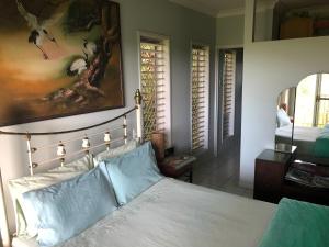 Ένα ή περισσότερα κρεβάτια σε δωμάτιο στο Mission Beach Escape BnB +14 φωτογραφίες