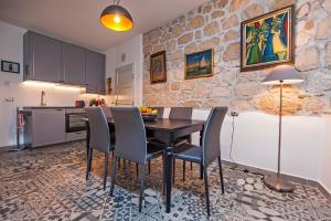 Kuchyň nebo kuchyňský kout v ubytování Seaview House Rosali