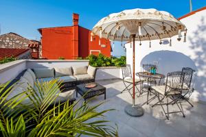 Patio nebo venkovní prostory v ubytování Seaview House Rosali
