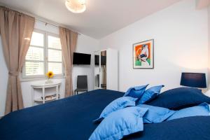 Postel nebo postele na pokoji v ubytování Seaview House Rosali