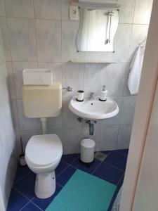 Phòng tắm tại Rooms and Apartments V&M