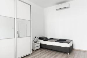 Ένα ή περισσότερα κρεβάτια σε δωμάτιο στο Tomasza 20 Apartment 140m2