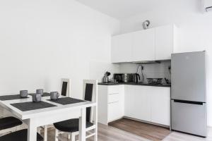 Η κουζίνα ή μικρή κουζίνα στο Tomasza 20 Apartment 140m2