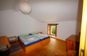 Postel nebo postele na pokoji v ubytování Nature house Jasenka