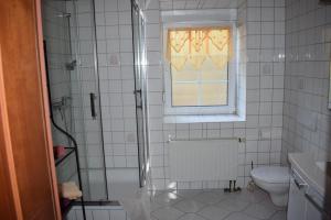 Phòng tắm tại Ferienwohnung Waldmühle +6 ảnh