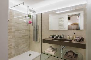a bathroom with a sink and a mirror at Diletta Casa Vacanze in Lecce