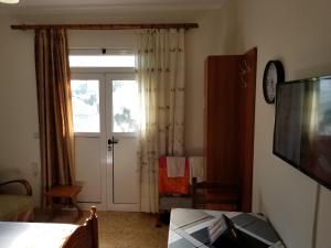 Televiisor ja/või meelelahutuskeskus majutusasutuses Berti Apartment
