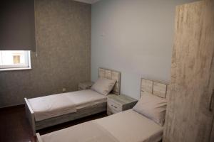 Säng eller sängar i ett rum på Liko Hostel