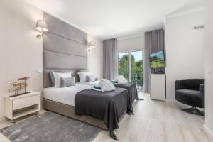 Postel nebo postele na pokoji v ubytování D_Loft Ocean + 54 fotografií
