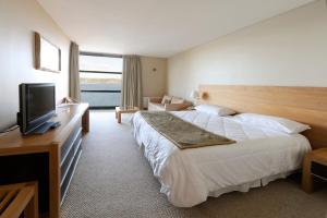 Postel nebo postele na pokoji v ubytování Hotel de Castro