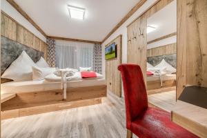 Llit o llits en una habitació de Alpen Air exklusive Apartments
