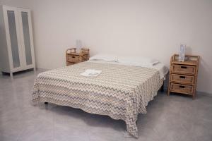 Postel nebo postele na pokoji v ubytování B&B Casa dei Nonni