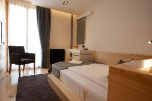 Rúm í herbergi á Hotel Žabljak