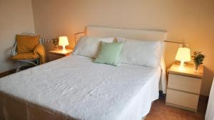 Postel nebo postele na pokoji v ubytování Apartamento Rías Baixas - 1a Línea Playa Raxó