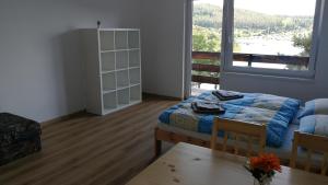 Posezení v ubytování Apartmány Orlík - Loužek