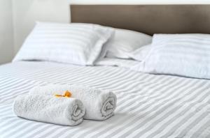 Postel nebo postele na pokoji v ubytování Hotel Trogirski Dvori