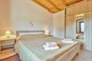 Ένα ή περισσότερα κρεβάτια σε δωμάτιο στο Villa Alba