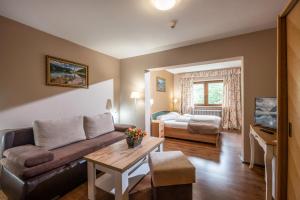 Postel nebo postele na pokoji v ubytování Alpenhotel Edelweiss