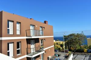 a view from the balcony of a building at Casa Silvana in Caniço