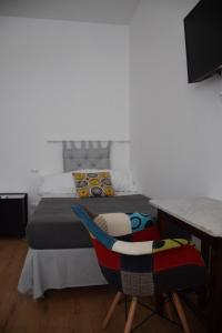 A bed or beds in a room at Levante