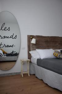 A bed or beds in a room at Levante