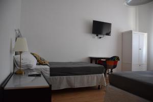 A bed or beds in a room at Levante