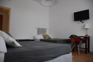 A bed or beds in a room at Levante