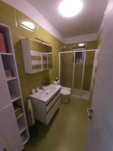 Ванна кімната в Apartment Mia