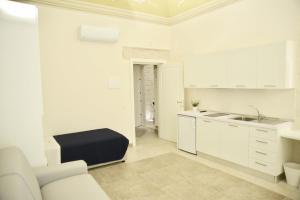A kitchen or kitchenette at NMCpalace