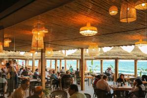 A restaurant or other place to eat at LOCA BEACH