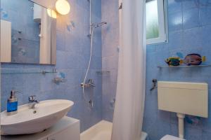 Kúpeľňa v ubytovaní Apartments Adri + 26 fotografií