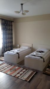 Un pat sau paturi într-o cameră la Agropensiunea Izana
