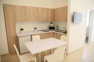 A kitchen or kitchenette at NMCpalace