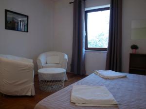 Postel nebo postele na pokoji v ubytování Apartments Lada + 37 fotografií