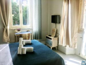 Un pat sau paturi într-o cameră la B&B Next Stop