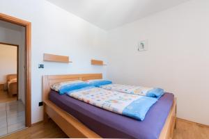 Posteľ alebo postele v izbe v ubytovaní Vila Eva