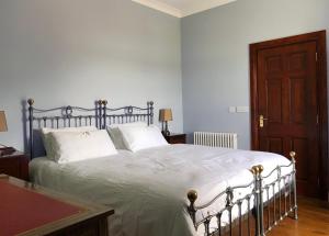 Ένα ή περισσότερα κρεβάτια σε δωμάτιο στο Andresna House