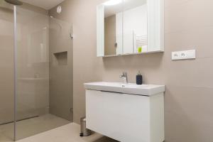 Koupelna v ubytování Baron Apartments Sušice